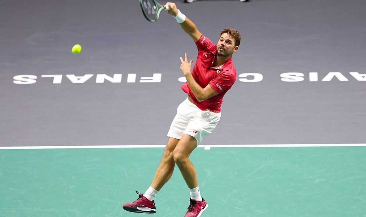 Stan Wawrinka hits a smash at the 2023 Davis Cup Finals
